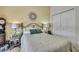 Neutral bedroom with views of the surrounding area and plenty of storage space at 10109 Holly Berry Dr, Spring Hill, FL 34613