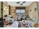 Comfortable living room featuring tile floors, lots of natural light, and cozy furniture for relaxing at 10109 Holly Berry Dr, Spring Hill, FL 34613