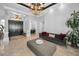 Grand foyer boasts coffered ceilings, tiled floors, and a seating area, creating an inviting entrance at 10712 Pontofino Cir, Trinity, FL 34655