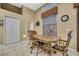 Cozy dining room with wood table, chairs, and natural light at 11253 Avalon Way, Spring Hill, FL 34609
