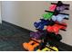 Rack of colorful dumbbells in a modern fitness center, making exercising convenient and accessible at 11814 Carissa Ln, New Port Richey, FL 34654