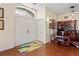 Welcoming foyer with hardwood floors and a double-door entrance at 11949 Wexford Blvd, Spring Hill, FL 34609