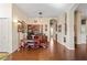A home office featuring wood floors, a desk, and additional storage with easy access to other areas of the home at 11949 Wexford Blvd, Spring Hill, FL 34609