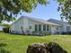 Spacious backyard with well-maintained lawn and mature trees at 12545 Dearborn Dr # D, Bayonet Point, FL 34667