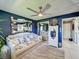 Nicely decorated bedroom with mirror and view to hallway at 12545 Dearborn Dr # D, Bayonet Point, FL 34667