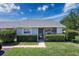 Charming single-story home with well-manicured lawn, lush landscaping, and welcoming front entrance at 12545 Dearborn Dr # D, Bayonet Point, FL 34667