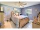 Serene main bedroom with stylish decor, a comfortable bed, and relaxing ambiance at 12545 Dearborn Dr # D, Bayonet Point, FL 34667