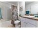 Bathroom featuring a shower and tub combination with a seashell themed shower curtain at 13160 Golden Lime Ave, Spring Hill, FL 34609