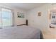 Comfortable bedroom with carpet, a bed, and a window with blinds and curtains at 13160 Golden Lime Ave, Spring Hill, FL 34609