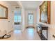 Inviting home foyer featuring neutral colors, tile flooring, and elegant decor at 13160 Golden Lime Ave, Spring Hill, FL 34609