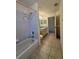 Bathroom showcasing shower and tub combo, and sink with lots of counterspace at 13377 Montour St, Brooksville, FL 34613