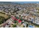 Aerial view of a waterfront property with canal access and proximity to the open bay, ideal for boating at 13741 Judy Ave, Hudson, FL 34667