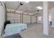 Spacious three-car garage featuring multiple storage areas and ample room for vehicles and equipment at 13741 Judy Ave, Hudson, FL 34667