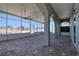 Expansive screened-in patio with brick floors, ceiling fans, and views of the surrounding neighborhood at 13741 Judy Ave, Hudson, FL 34667