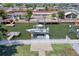 Waterfront property boasting a private dock and boat lift, complemented by tranquil views and charming surroundings at 13741 Judy Ave, Hudson, FL 34667