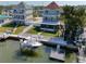 Picturesque waterfront property with private boat dock, fenced yard, and serene water views, perfect for relaxation at 13741 Judy Ave, Hudson, FL 34667
