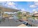 Waterfront backyard features a large patio perfect for relaxing and taking in the waterway views at 13815 Plumosa Ave, Hudson, FL 34667