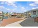 Waterfront backyard with a large wooden dock and boat lift and plenty of space to entertain at 13815 Plumosa Ave, Hudson, FL 34667