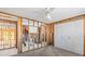 A bedroom under construction exhibits a doorway, closet, and ceiling fan at 13815 Plumosa Ave, Hudson, FL 34667