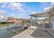 Waterfront home featuring a covered patio, and a dock for easy boat access at 13815 Plumosa Ave, Hudson, FL 34667