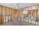 Open-concept space featuring new floors and ceiling fans at 13815 Plumosa Ave, Hudson, FL 34667
