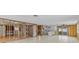 Spacious room ready for remodel features tiled floors and ample natural light at 13815 Plumosa Ave, Hudson, FL 34667