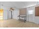 A room under construction featuring tile floors and an exterior door at 13815 Plumosa Ave, Hudson, FL 34667