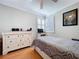 Bedroom with white furnishings and shuttered windows, creating a bright, clean aesthetic at 16022 Westerham Dr, Tampa, FL 33647