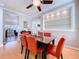 Inviting dining room with built-in display shelves and an adjacent sitting room at 16022 Westerham Dr, Tampa, FL 33647