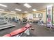 A fitness center with modern exercise equipment and a mirrored wall at 18109 Tiverton Ct, Hudson, FL 34667