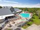 Relax by the pool with ample seating at the clubhouse, offering a perfect spot for leisure and recreation at 18109 Tiverton Ct, Hudson, FL 34667