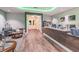 The reception area features a counter with a wood-style floor and modern decor at 18109 Tiverton Ct, Hudson, FL 34667