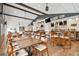 A restaurant with tables and chairs with bar and television in the background at 18109 Tiverton Ct, Hudson, FL 34667