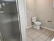 Standard bathroom with a glass shower stall and tile flooring at 18232 Monteverde Dr, Spring Hill, FL 34610
