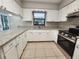 Kitchen featuring ample counter space, updated appliances, and bright natural light at 18232 Monteverde Dr, Spring Hill, FL 34610