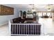 Comfortable living room with leather furniture, tile floors, and elegant decor at 22106 Garmisch Way, Brooksville, FL 34601