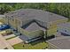 Beautiful aerial view of modern townhomes showcasing architectural style and manicured landscaping at 3032 Jacob Crossing Ln, Holiday, FL 34691