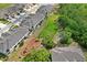 Community aerial showcasing dog park, playground, and residential townhomes at 3032 Jacob Crossing Ln, Holiday, FL 34691