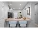 Kitchen with breakfast bar, stone countertops, pendant lighting, and stainless steel appliances at 3032 Jacob Crossing Ln, Holiday, FL 34691