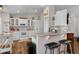Bright kitchen features granite countertops, stainless steel appliances, and a breakfast bar at 3345 Carmen Ave, Spring Hill, FL 34609