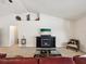 Cozy living room showcasing a fireplace, and comfortable seating at 3455 Whispy Ct, Spring Hill, FL 34609