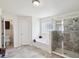 Bright bathroom featuring a soaking tub, tiled shower, and tiled floors at 3455 Whispy Ct, Spring Hill, FL 34609