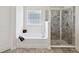 Bathroom features a large soaking tub and tiled shower with glass enclosure at 3455 Whispy Ct, Spring Hill, FL 34609