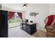 Dedicated office space with large window and stylish decor, perfect for working from home at 3455 Whispy Ct, Spring Hill, FL 34609