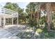 Backyard area near the house with palm trees at 3461 Gum Dr, Weeki Wachee, FL 34607