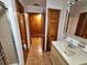 Bathroom with shower, sink, vanity, and tile flooring at 3461 Gum Dr, Weeki Wachee, FL 34607