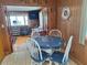 Quaint breakfast nook off kitchen with nautical-themed decor and access to living room at 3461 Gum Dr, Weeki Wachee, FL 34607