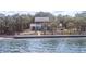 Coastal home surrounded by palm trees and beautiful water views at 3461 Gum Dr, Weeki Wachee, FL 34607