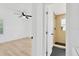 Modern bathroom with black tiled shower and floors, next to bedroom at 4035 Fairfield S Ave, St Petersburg, FL 33711