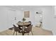 Cozy dining area with seating for four and natural light at 4035 Fairfield S Ave, St Petersburg, FL 33711